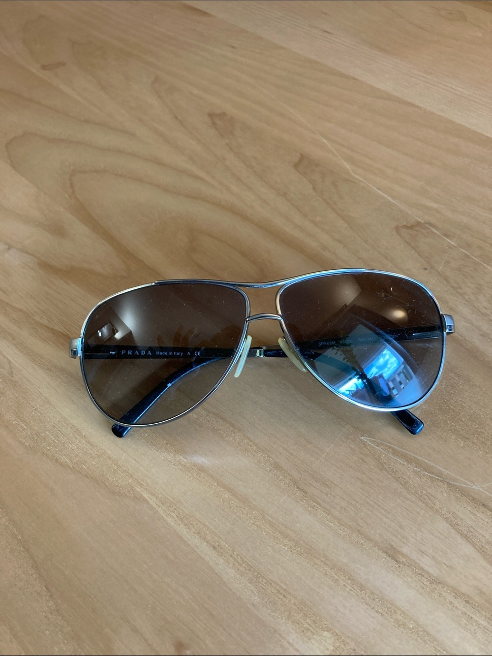 Prada Silver Aviator Sunglasses with Brown Gradient Lenses